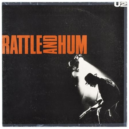 Lot #4670  U2 Signed Album - Image 1