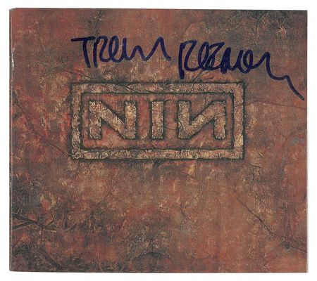 Lot #4757 Trent Reznor Signed CDs and Insert