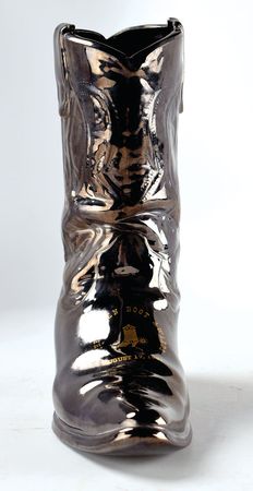 Lot #7067 Robert Shelton's Golden Boot Award and Mug - Image 1