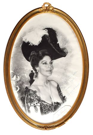 Lot #7040 Ava Gardner and John Huston Signed and Production-Made Photograph from The Life and Times of Judge Roy Bean - Image 1