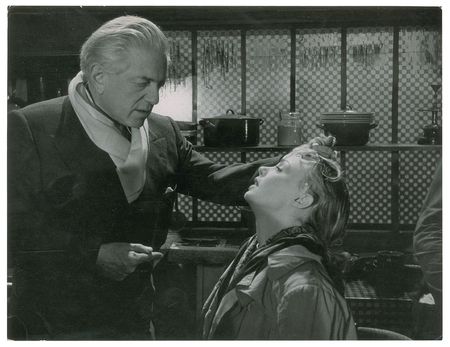 Lot #7293  Act of Love: Anatole Litvak and Dany Robin Pair of Original Photographs by David Seymour - Image 1