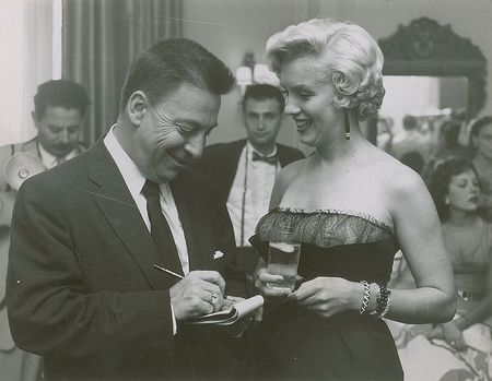 Lot #569 Marilyn Monroe and Earl Wilson Photograph - Image 1