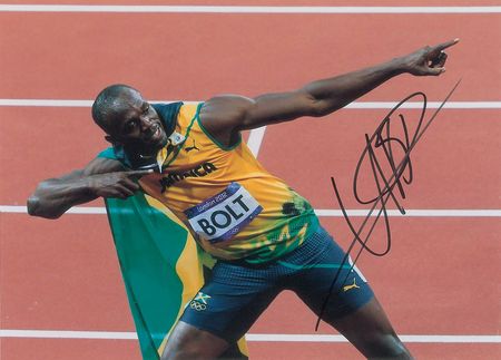 Lot #749 Usain Bolt Signed Photographs - Image 1