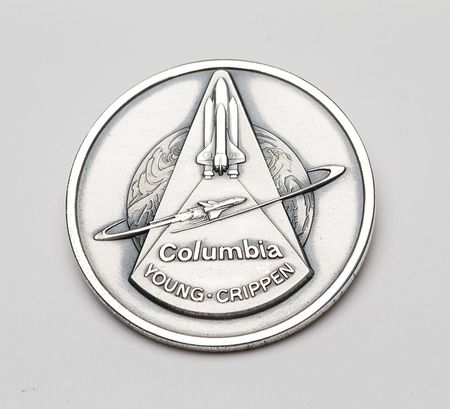 Lot #6284  STS-1 Unflown Robbins Medal - Image 1