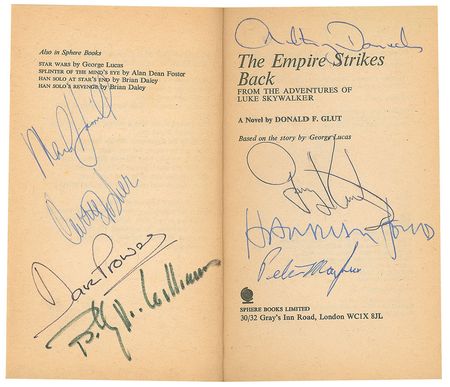 Lot #635 Star Wars: Stellar multi-signed Empire Strikes Back novel starring Ford, Hamill, Fisher, and more - Image 1
