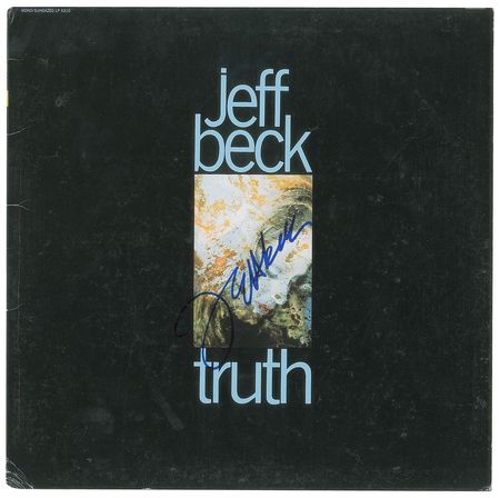 Lot #6157 Jeff Beck and Ronnie Wood Signed Album - Image 1