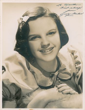 Lot #820 Judy Garland: A star is born!—the 14-year-old Garland signs a gorgeous Bull portrait - Image 1