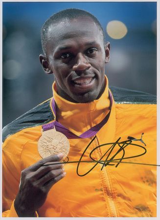 Lot #950 Usain Bolt Signed Photographs - Image 1
