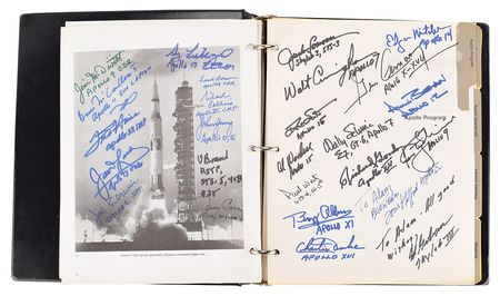 Lot #315 Astronauts: Apollo Spacecraft manual signed by 26 of NASA's finest, including seven moonwalkers - Image 1