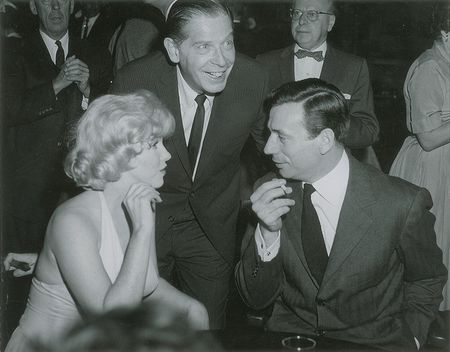 Lot #847 Marilyn Monroe, Yves Montand, and Milton Berle Photograph - Image 1