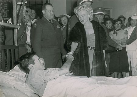 Lot #834 Marilyn Monroe and US Servicemen Photograph - Image 1