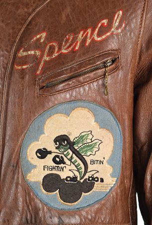 Lot #328 WWII: Spencer H. Scherer's B-17 'Hangover' 369th Bomb Squadron Flight Jacket: Extraordinary hand-painted ?Fightin? Bitin?? 8th Air Force jacket, with a piece of flak that hit the airman's bomber - Image 5