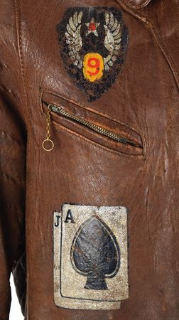 Lot #328 WWII: Spencer H. Scherer's B-17 'Hangover' 369th Bomb Squadron Flight Jacket: Extraordinary hand-painted ?Fightin? Bitin?? 8th Air Force jacket, with a piece of flak that hit the airman's bomber - Image 6