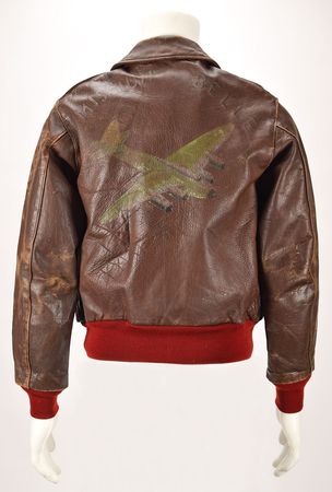 Lot #327 WWII: Harry Larson's B-17 'Mission Belle' 885th Bomb Squadron A-2 Jacket and Uniform Group Lot: The 15th Air Force jacket and tunic of a special ops navigator - Image 1