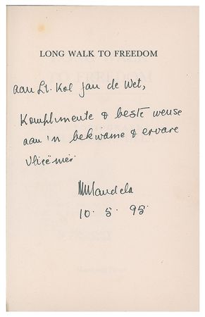 Lot #163 Nelson Mandela: Inscribed to a pilot on the first anniversary of his inauguration - Image 1
