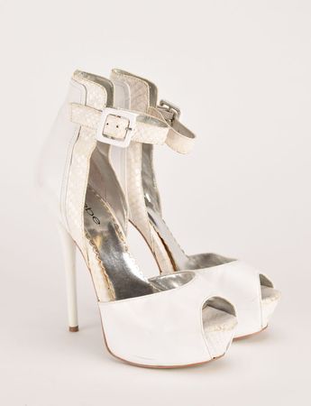 Lot #9282  Prince: Sheila E.'s Personally-Worn and Signed White Bebe Shoes - Image 1