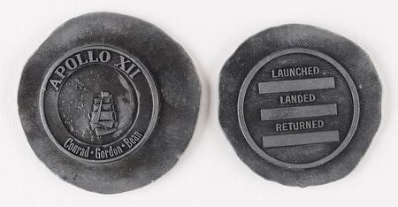 Lot #2297  Apollo 12 Robbins Medal and Uncut Lead Strikes - Image 1