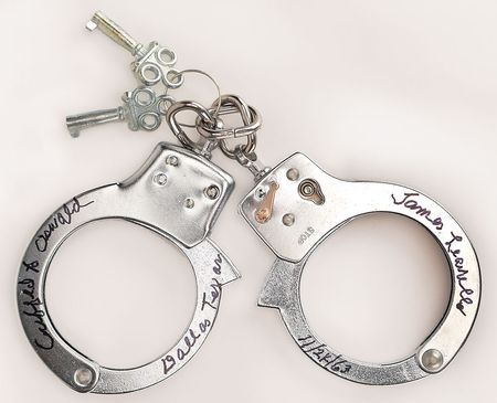 Lot #72 Kennedy Assassination: Jim Leavelle Signed Handcuffs Handcuffs - Image 1