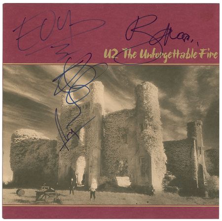 Lot #5323  U2 Signed Album - Image 1