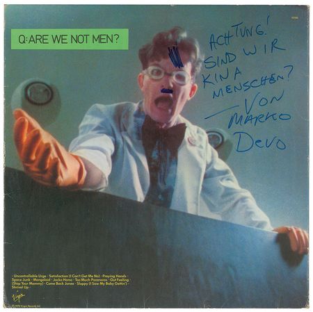 Lot #5464  Devo Signed Album - Image 1