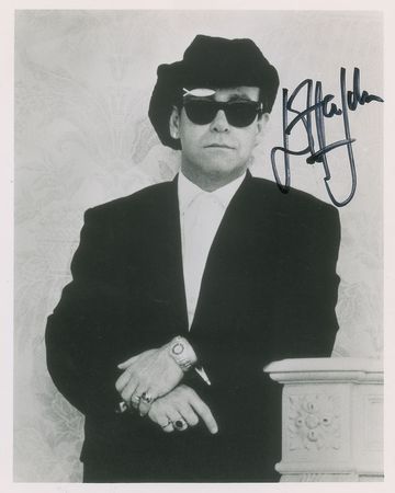 Lot #556 Elton John - Image 1