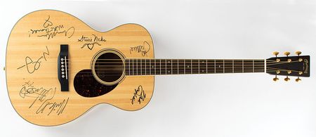 Lot #586 Fleetwood Mac: Martin orchestra model guitar, fully signed by the current Fleetwood Mac lineup?plus three rare guitar picks - Image 1