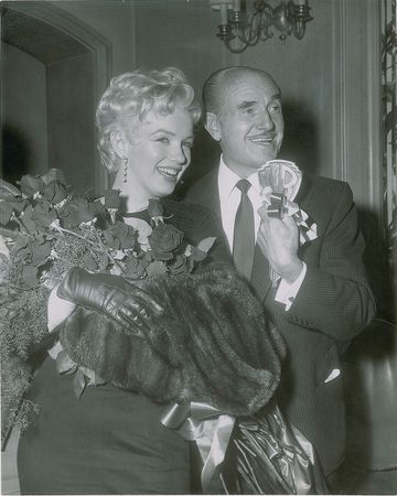 Lot #952 Marilyn Monroe and Jack Warner Photograph - Image 1