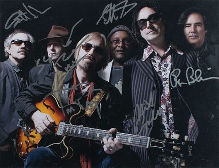 Lot #573 Tom Petty and the Heartbreakers Signed Photograph - Image 1