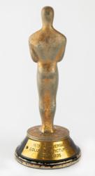 Lot #894 Columbia Pictures: Mini Oscar statuette produced by Columbia to commemorate their 1935 Academy Award success - Image 2