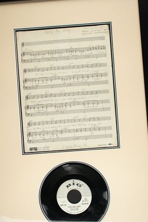 Lot #588 Simon and Garfunkel: Original manuscripts from Simon and Garfunkel, including Simon's first solo tune: 