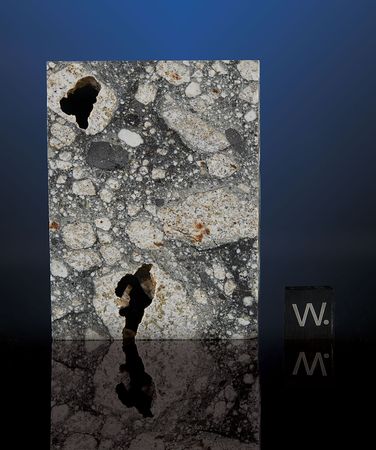 Lot #4568  Northwest Africa (NWA) 5000 Lunar Meteorite Part Slice “The Eclipse” - Image 1