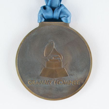 Lot #5535  53rd Annual Grammy Awards: Bronze Tiffany Nominee Medal - Image 3