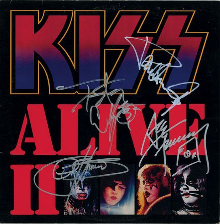 Lot #5453  KISS Signed Album - Image 1
