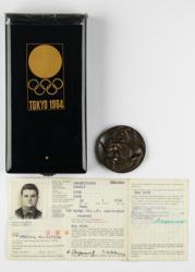 Lot #7081  Tokyo 1964 Summer Olympics ID Card, Participation Medal, and Gold Medal Case - Image 1