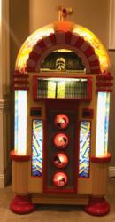 Lot #618 Beatles Limited Edition 'Yellow Submarine' Rock-Ola Jukebox: Embodying the psychedelic splendor of Yellow Submarine, a rare Rock-Ola Beatles jukebox—one of just 100 made! - Image 1