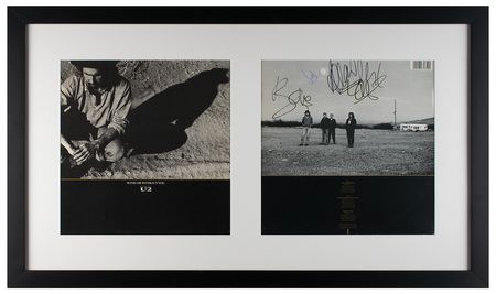 Lot #5370 U2 Signed Album