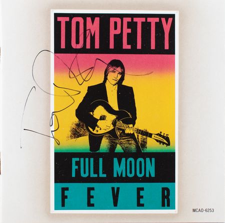 Lot #5306 Tom Petty Signed CD - Image 1
