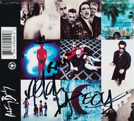Lot #5391 U2 Signed CD - Image 1
