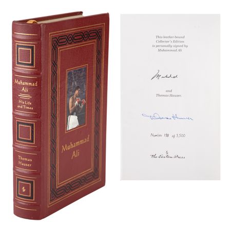 Lot #1042 Muhammad Ali Signed Book