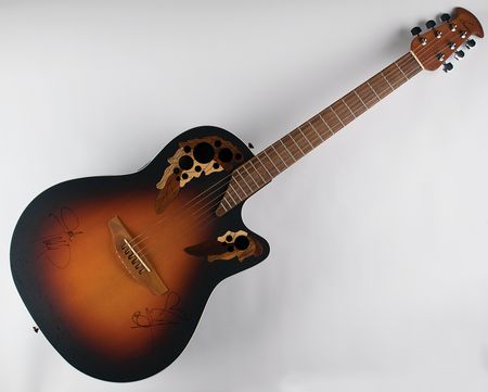 Lot #756 Justin Timberlake and Christina Aguilera Signed Guitar - Image 1
