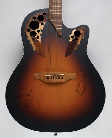 Lot #756 Justin Timberlake and Christina Aguilera Signed Guitar - Image 2