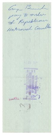 Lot #79 George Bush: As chairman, Bush signs over a check 