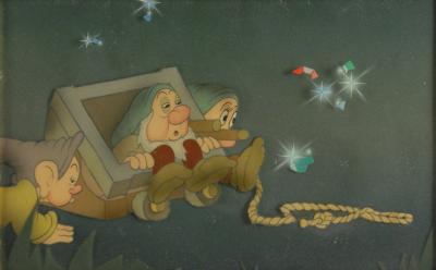 Lot #958 Sleepy, Dopey, and Bashful production cel from Snow White and the Seven Dwarfs - Image 1