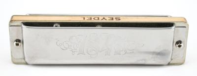 Lot #767 Prince's Personally-Owned and Played Harmonica: Harmonica played by Prince 