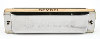 Lot #767 Prince's Personally-Owned and Played Harmonica: Harmonica played by Prince 
