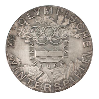 Lot #6097 Innsbruck 1976 Winter Olympics Silvered Bronze Participation Medal - Image 1