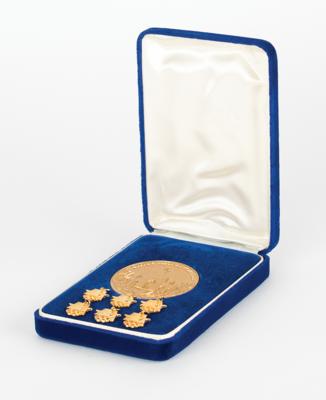 Lot #6122 Los Angeles 1984 Summer Olympics Volunteer Participation Medal and (6) Gold Logo Charms - Image 1