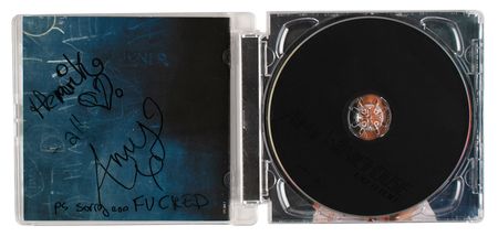 Lot #543 Amy Winehouse: Winehouse apologizes for a sloppy autograph, 