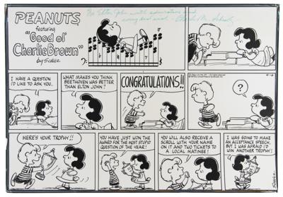 Lot #685 Charles Schulz Signed Peanuts Print Inscribed to Elton John - Image 1