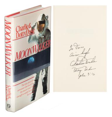 Lot #9439 Charlie Duke Signed Book and Program - Image 1